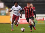 15 May 2021; Aodh Dervin of Longford Town in action against Promise Omochere of Bohemians during the SSE Airtricity League Premier Division match between Longford Town and Bohemians at Bishopsgate in Longford. Photo by Ben McShane/Sportsfile