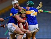 15 May 2021; Alan Connolly of Cork is tackled by Tipperary players Padraic Maher, left, and Cathal Barrett during the Allianz Hurling League Division 1 Group A Round 2 match between Tipperary and Cork at Semple Stadium in Thurles, Tipperary. Photo by Ray McManus/Sportsfile