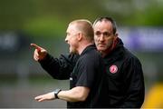 15 May 2021; Tyrone joint-manager Brian Dooher with linesman Barry Cassidy during the Allianz Football League Division 1 North Round 1 match between Tyrone and Donegal at Healy Park in Omagh, Tyrone. Photo by Stephen McCarthy/Sportsfile