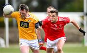 15 May 2021; James Laverty of Antrim in action against Andy McDonnell of Louth during the Allianz Football League Division 4 North Round 1 match between Louth and Antrim at Geraldines Club in Haggardstown, Louth. Photo by Ramsey Cardy/Sportsfile