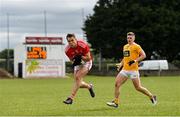 15 May 2021; Andy McDonnell of Louth in action against James McAuley of Antrim during the Allianz Football League Division 4 North Round 1 match between Louth and Antrim at Geraldines Club in Haggardstown, Louth. Photo by Ramsey Cardy/Sportsfile