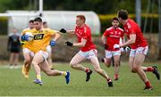 15 May 2021; Patrick McBride of Antrim in action against Donal McKenny of Louth during the Allianz Football League Division 4 North Round 1 match between Louth and Antrim at Geraldines Club in Haggardstown, Louth. Photo by Ramsey Cardy/Sportsfile