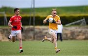 15 May 2021; Mark Jordan of Antrim and Declan Byrne of Louth during the Allianz Football League Division 4 North Round 1 match between Louth and Antrim at Geraldines Club in Haggardstown, Louth. Photo by Ramsey Cardy/Sportsfile