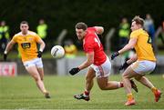15 May 2021; Sam Mulroy of Louth in action against Peter Healy of Antrim during the Allianz Football League Division 4 North Round 1 match between Louth and Antrim at Geraldines Club in Haggardstown, Louth. Photo by Ramsey Cardy/Sportsfile
