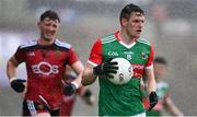 15 May 2021; Matthew Ruane of Mayo gets past Ryan McEvoy of Down during the Allianz Football League Division 2 North Round 1 match between Mayo and Down at Elverys MacHale Park in Castlebar, Mayo. Photo by Piaras Ó Mídheach/Sportsfile