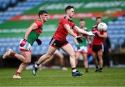 15 May 2021; Ceilium Doherty of Down in action against Jordan Flynn of Mayo during the Allianz Football League Division 2 North Round 1 match between Mayo and Down at Elverys MacHale Park in Castlebar, Mayo. Photo by Piaras Ó Mídheach/Sportsfile