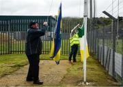 16 May 2021; Stewards John Dunne, left, and Johnny Murphy raise the county flags before the Allianz Football League Division 3 South Round 1 match between Wicklow and Offaly at the County Grounds in Aughrim, Wicklow. Photo by Harry Murphy/Sportsfile