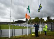 16 May 2021; Stewards John Dunne, left, and Johnny Murphy raise the flags before the Allianz Football League Division 3 South Round 1 match between Wicklow and Offaly at the County Grounds in Aughrim, Wicklow. Photo by Harry Murphy/Sportsfile