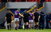 16 May 2021; Matthew O'Hanlon of Wexford and Wexford manager Davy Fitzgerald talk to referee Fergal Horgan as they leave the field at half time during the Allianz Hurling League Division 1 Group B Round 2 match between Clare and Wexford at Cusack Park in Ennis, Clare. Photo by Ray McManus/Sportsfile