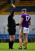 16 May 2021; Joe O'Connor of Wexford is shown a yellow card by referee Fergal Horgan, and ultimately is given a period in the sin bin, during the Allianz Hurling League Division 1 Group B Round 2 match between Clare and Wexford at Cusack Park in Ennis, Clare. Photo by Ray McManus/Sportsfile