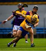 16 May 2021; Mark Rogers of Clare is tackled by Joe O'Connor of Wexford during the Allianz Hurling League Division 1 Group B Round 2 match between Clare and Wexford at Cusack Park in Ennis, Clare. Photo by Ray McManus/Sportsfile