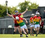 16 May 2021; Aaron Amond of Carlow in action against Caolan Taggart of Down during the Allianz Hurling League Division 2A Round 2 match between Down and Carlow at McKenna Park in Ballycran, Down. Photo by Eóin Noonan/Sportsfile