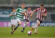 15 May 2021; Rory Gaffney of Shamrock Rovers in action against Cameron McJannet of Derry City during the SSE Airtricity League Premier Division match between Shamrock Rovers and Derry City at Tallaght Stadium in Dublin. Photo by Seb Daly/Sportsfile