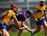 16 May 2021; Shane Rock of Wexford is tackled by Liam Corry of Clare during the Allianz Hurling League Division 1 Group B Round 2 match between Clare and Wexford at Cusack Park in Ennis, Clare. Photo by Ray McManus/Sportsfile