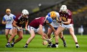 16 May 2021; Billy Power of Waterford in action against Westmeath players, from left, Robbie Greville, Joey Boyle and Shane Clavin during the Allianz Hurling League Division 1 Group A Round 2 match between Waterford and Westmeath at Walsh Park in Waterford. Photo by Seb Daly/Sportsfile