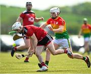 16 May 2021; Jordan Doran of Down in action against Aaron Amond of Carlow during the Allianz Hurling League Division 2A Round 2 match between Down and Carlow at McKenna Park in Ballycran, Down. Photo by Eóin Noonan/Sportsfile