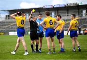 16 May 2021; Referee Derek O'Mahoney issues a yellow card to Niall Daly, 6, of Roscommon during the Allianz Football League Division 1 South Round 1 match between Roscommon and Dublin at Dr Hyde Park in Roscommon. Photo by Stephen McCarthy/Sportsfile