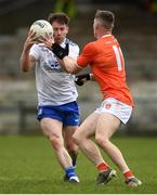 16 May 2021; Karl O'Connell of Monaghan in action against Ciaron OHanlon of Armagh during the Allianz Football League Division 1 North Round 1 match between Monaghan and Armagh at Brewster Park in Enniskillen, Fermanagh. Photo by Philip Fitzpatrick/Sportsfile