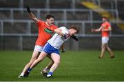 16 May 2021; Kieran Duffy of Monaghan in action against Niall Grimley of Armagh during the Allianz Football League Division 1 North Round 1 match between Monaghan and Armagh at Brewster Park in Enniskillen, Fermanagh. Photo by David Fitzgerald/Sportsfile