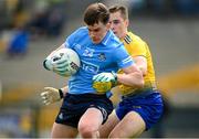 16 May 2021; Dara Mullin of Dublin in action against David Murray of Roscommon during the Allianz Football League Division 1 South Round 1 match between Roscommon and Dublin at Dr Hyde Park in Roscommon. Photo by Stephen McCarthy/Sportsfile