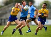 16 May 2021; Ciaran Kilkenny of Dublin in action against Diarmuid Murtagh, left, and Brian Stack of Roscommon during the Allianz Football League Division 1 South Round 1 match between Roscommon and Dublin at Dr Hyde Park in Roscommon. Photo by Stephen McCarthy/Sportsfile