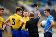 16 May 2021; Fergal Lennon of Roscommon is issued with a black card by referee Derek O'Mahoney during the Allianz Football League Division 1 South Round 1 match between Roscommon and Dublin at Dr Hyde Park in Roscommon. Photo by Stephen McCarthy/Sportsfile