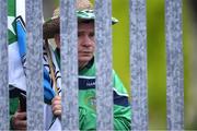 16 May 2021; Limerick supporter Hammy Dawson, club-mate of Gearóid Hegarty in St Patrick's GAA, watches on from outside the ground while listening to the match on the radio during the Allianz Hurling League Division 1 Group A Round 2 match between Galway and Limerick at Pearse Stadium in Galway. Photo by Piaras Ó Mídheach/Sportsfile