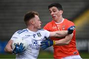 16 May 2021; Ryan McAnespie of Monaghan in action against Rory Grugan of Armagh during the Allianz Football League Division 1 North Round 1 match between Monaghan and Armagh at Brewster Park in Enniskillen, Fermanagh. Photo by David Fitzgerald/Sportsfile