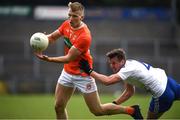 16 May 2021; Rian O'Neill of Armagh in action against Ryan Wylie of Monaghan during the Allianz Football League Division 1 North Round 1 match between Monaghan and Armagh at Brewster Park in Enniskillen, Fermanagh. Photo by Philip Fitzpatrick/Sportsfile