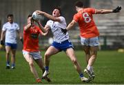 16 May 2021; Andrew Woods of Monaghan is tackled by Ciaron O'Hanlon, left, and Niall Grimley of Armagh during the Allianz Football League Division 1 North Round 1 match between Monaghan and Armagh at Brewster Park in Enniskillen, Fermanagh. Photo by David Fitzgerald/Sportsfile