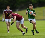 16 May 2021; Shane McEntee of Meath evades the tackle by David Lynch of Westmeath during the Allianz Football League Division 2 North Round 1 match between Meath and Westmeath at Páirc Tailteann in Navan, Meath. Photo by Ramsey Cardy/Sportsfile