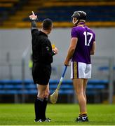 16 May 2021; Joe O'Connor of Wexford is shown a yellow card by referee Fergal Horgan, and ultimayely a period in the sin bin, during the Allianz Hurling League Division 1 Group B Round 2 match between Clare and Wexford at Cusack Park in Ennis, Clare. Photo by Ray McManus/Sportsfile