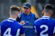 16 May 2021; Laois manager Mike Quirke talking to his players after the Allianz Football League Division 2 South Round 1 match between Clare and Laois at Cusack Park in Ennis, Clare. Photo by Ray McManus/Sportsfile