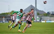 15 May 2021; Aidomo Emakhu of Shamrock Rovers in action against Cameron McJannet of Derry City during the SSE Airtricity League Premier Division match between Shamrock Rovers and Derry City at Tallaght Stadium in Dublin. Photo by Seb Daly/Sportsfile