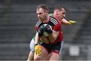 15 May 2021; Gerard McGovern of Down in action against Eoghan McLaughlin of Mayo during the Allianz Football League Division 2 North Round 1 match between Mayo and Down at Elverys MacHale Park in Castlebar, Mayo. Photo by Piaras Ó Mídheach/Sportsfile