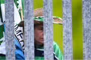 16 May 2021; Limerick supporter Hammy Dawson, club-mate of Gearóid Hegarty in St Patrick's GAA, watches on from outside the ground while listening to the match on the radio during the Allianz Hurling League Division 1 Group A Round 2 match between Galway and Limerick at Pearse Stadium in Galway. Photo by Piaras Ó Mídheach/Sportsfile