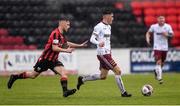 15 May 2021; Dawson Devoy of Bohemians and Aaron Bolger of Longford Town during the SSE Airtricity League Premier Division match between Longford Town and Bohemians at Bishopsgate in Longford. Photo by Ben McShane/Sportsfile