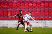 15 May 2021; Andy Lyons of Bohemians and Aaron Bolger of Longford Town during the SSE Airtricity League Premier Division match between Longford Town and Bohemians at Bishopsgate in Longford. Photo by Ben McShane/Sportsfile