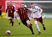 15 May 2021; Ross Tierney of Bohemians and Dean Zambra of Longford Town during the SSE Airtricity League Premier Division match between Longford Town and Bohemians at Bishopsgate in Longford. Photo by Ben McShane/Sportsfile