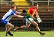 15 May 2021; Paul Broderick of Carlow in action against Sean Boyce of Waterford during the Allianz Football League Division 3 North Round 1 match between Waterford and Carlow at Fraher Field in Dungarvan, Waterford. Photo by Matt Browne/Sportsfile