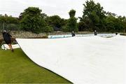 20 May 2021; Ground staff working on the pitch at the Cricket Ireland InterProvincial Cup 2021 match between Leinster Lightning and Munster Reds at Pembroke Cricket Club in Dublin. Photo by Matt Browne/Sportsfile
