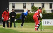 20 May 2021; Barry McCarthy of Leinster Lightning bowls to Gareth Delaney of Munster Reds during the Cricket Ireland InterProvincial Cup 2021 match between Leinster Lightning and Munster Reds at Pembroke Cricket Club in Dublin. Photo by Matt Browne/Sportsfile