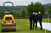 21 May 2021; Match referee Graham McCrea, centre, and Umpires Roland Black, left, and Alan Neill inspect the pitch after play was delayed before the Cricket Ireland InterProvincial Cup 2021 match between North West Warriors and Northern Knights at Bready Cricket Club in Magheramason, Tyrone. Photo by Sam Barnes/Sportsfile