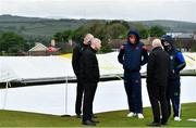 21 May 2021; Match referee Graham McCrea, second from left, and Umpires Roland Black, far left, and Alan Neill, second from right, speak with North West Warriors captain Andy McBrine and Northern Knights captain Harry Tector after play was delayed before the Cricket Ireland InterProvincial Cup 2021 match between North West Warriors and Northern Knights at Bready Cricket Club in Magheramason, Tyrone. Photo by Sam Barnes/Sportsfile