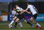 21 May 2021; Dean Williams of Shamrock Rovers in action against Michael Duffy, left, and Raivis Jurkovskis of Dundalk during the SSE Airtricity League Premier Division match between Dundalk and Shamrock Rovers at Oriel Park in Dundalk, Louth. Photo by Ben McShane/Sportsfile