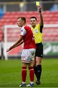 21 May 2021; Referee Rob Hennessy shows a yellow card to Jamie Lennon of St Patrick's Athletic during the SSE Airtricity League Premier Division match between St Patrick's Athletic and Bohemians at Richmond Park in Dublin. Photo by Harry Murphy/Sportsfile