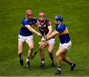 22 May 2021; TJ Brennan of Galway in action against Tipperary players Niall O'Meara, left, and John McGrath during the Allianz Hurling League Division 1 Group A Round 3 match between Tipperary and Galway at Semple Stadium in Thurles, Tipperary. Photo by Ray McManus/Sportsfile