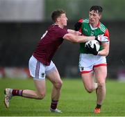 22 May 2021; Cillian O'Connor of Mayo is tackled by Ray Connellan of Westmeath during the Allianz Football League Division 2 North Round 2 match between Westmeath and Mayo at TEG Cusack Park in Mullingar, Westmeath. Photo by Stephen McCarthy/Sportsfile