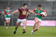 22 May 2021; Fionn McDonagh of Mayo is tackled by David Lynch of Westmeath during the Allianz Football League Division 2 North Round 2 match between Westmeath and Mayo at TEG Cusack Park in Mullingar, Westmeath. Photo by Stephen McCarthy/Sportsfile