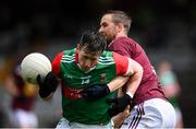 22 May 2021; Cillian O'Connor of Mayo is tackled by Kevin Maguire of Westmeath during the Allianz Football League Division 2 North Round 2 match between Westmeath and Mayo at TEG Cusack Park in Mullingar, Westmeath. Photo by Stephen McCarthy/Sportsfile